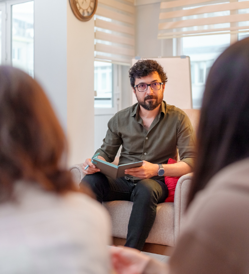 Couples Counseling Near Me Couple with therapist in session Couples Counseling Near Me